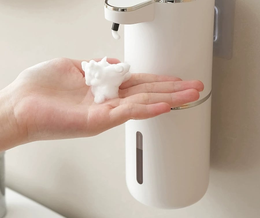 Foam in a hand under the Automatic Soap Dispenser